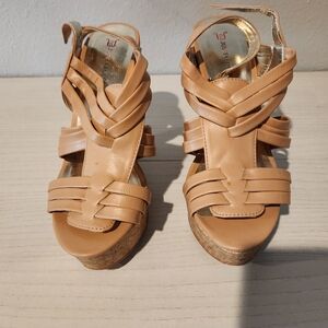 Size 9 Tan sandal 3 1/2 inch high cork wedge heel